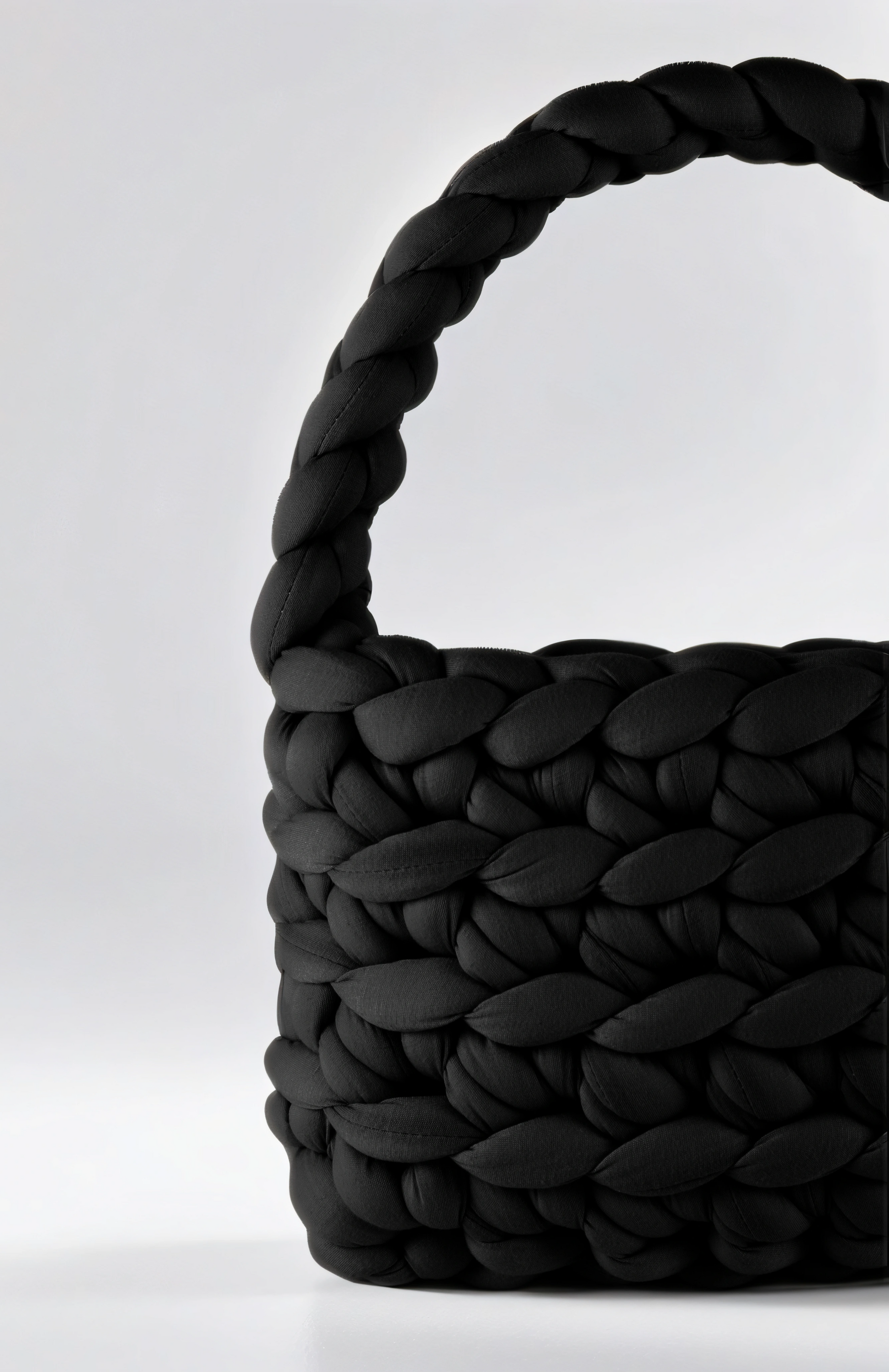 Black color Chunky bag baguette-shaped closed up half of the bag