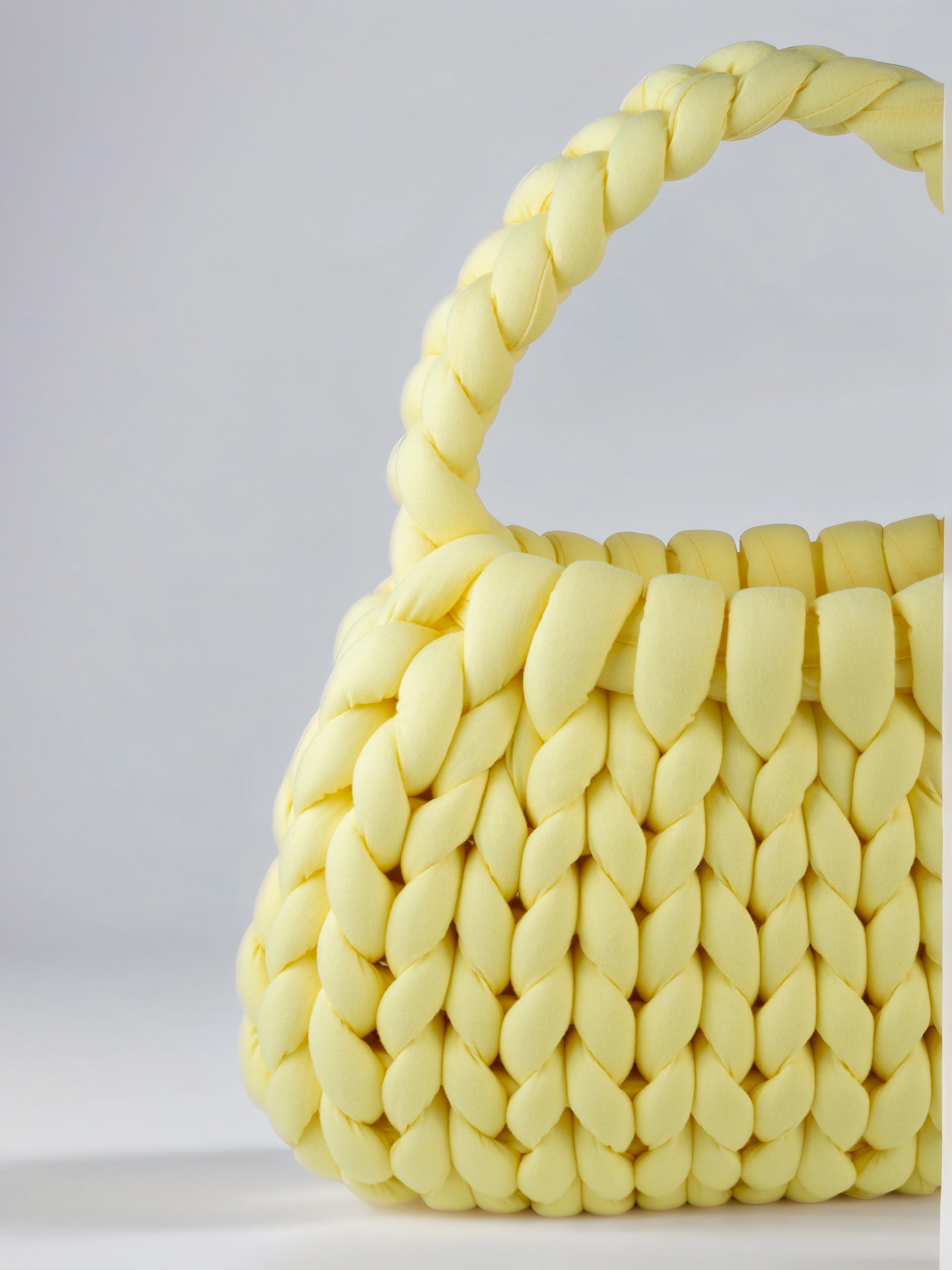 Yellow color Chunky crescent shape bag closed up half bag